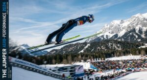 A sleek, professional editorial shot of a professional ski jumper in a high-tech aerodynamic suit mi
